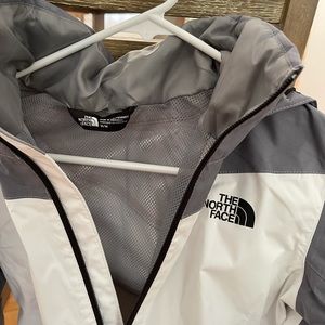 Grey and white rain jacket